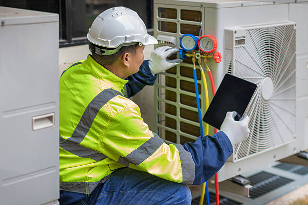 Professional Emergency Ac Repair technician working in Polk City, IA